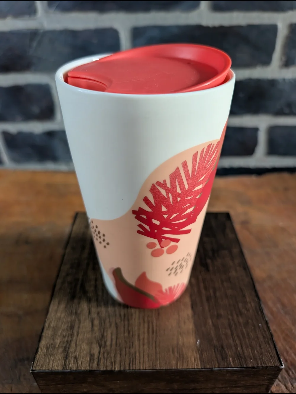 Starbucks White Ceramic Travel Mug with Coral Lid and Pinecone Accent